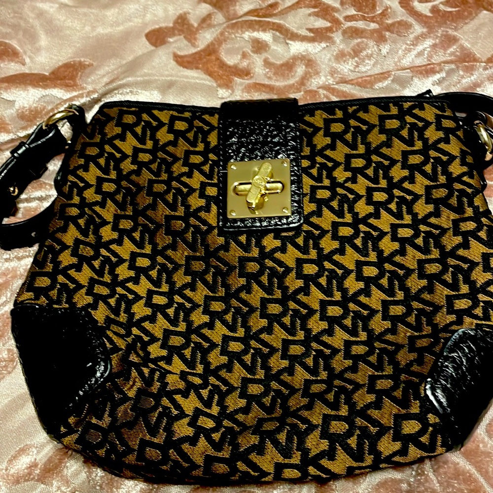DKNY authentic signature purse with adjustable leather straps